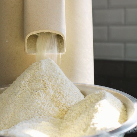 Flour being milled